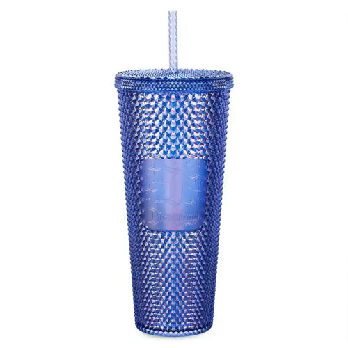 Blue studded tumbler with a straw.