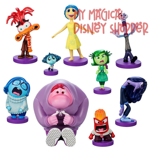 Set of colorful animated character figurines on a white background.